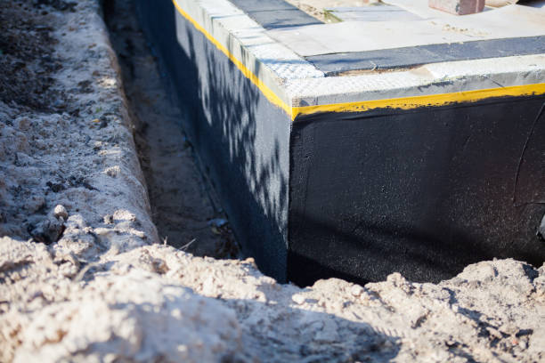 Professional Waterproofing technician working in Forest Lake, IL